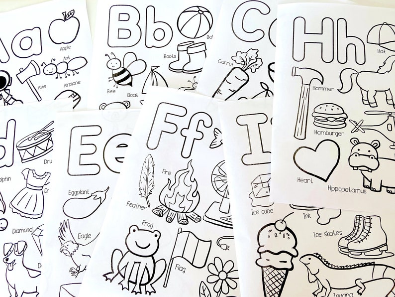 May include: Black and white alphabet flashcards with illustrations of objects starting with each letter. The letters are in uppercase and lowercase. The illustrations include an apple, bee, carrot, hammer, ice cube, frog, and more.