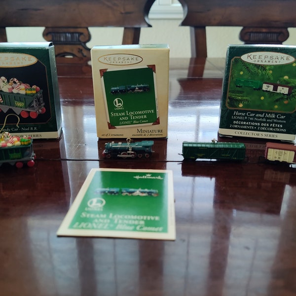 3 Hallmark Train Keepsake Miniature Ornaments with one Candy Car, a Steam Locomotive, Horse and Milk Car
