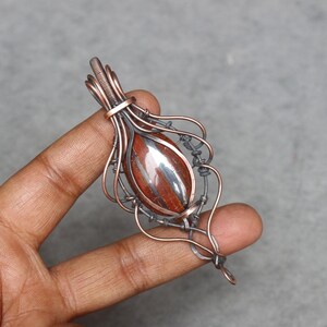 Handmade Iron Tiger Eye Pendant: Copper Wire Wrapped Gemstone Boho Jewelry