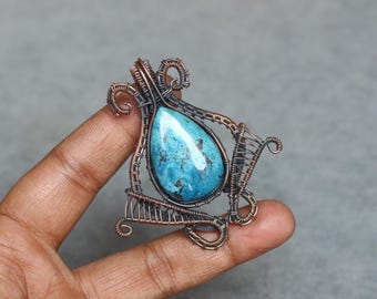 Handgemaakte met koperdraad gewikkelde Chrysocolla-hanger: boho-edelsteensieraden