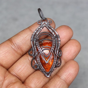 Handmade Copper Wire Wrapped Baltic Amber Pendant: Boho Gemstone Jewelry