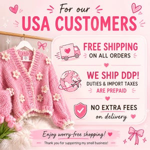 May include: A pink cardigan with white flower appliqu&eacute;s hangs on a gold rod. The image includes text that reads "For our USA CUSTOMERS" and "Enjoy worry-free shopping!" with additional text about shipping.
