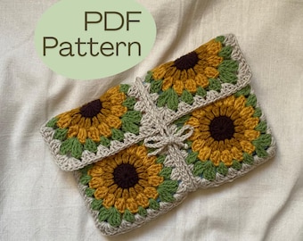 May include: A crocheted clutch bag with a sunflower motif. The bag is made with yellow, brown, and green yarn, with a beige border and a matching tie closure. The text "PDF Pattern" is in a green oval.