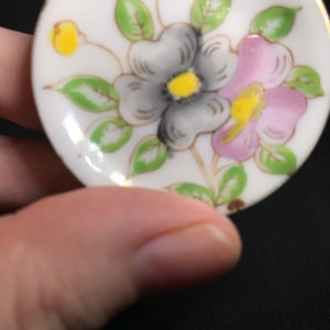 Tiny Floral Plate Made in Japan marked “A Mark L exclusive”