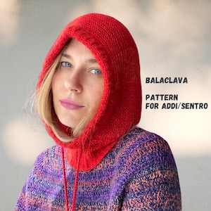 May include: A red knitted balaclava with a hood. The balaclava is made with a simple stitch pattern. The text "BALACLAVA PATTERN FOR ADDI/SENTRO" is visible in the image.