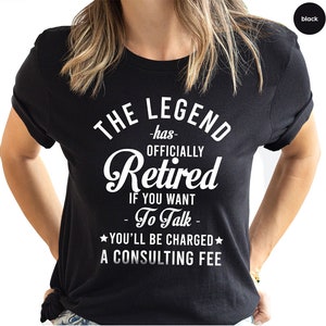 a woman wearing a black shirt that says the legend has officially retired if you want