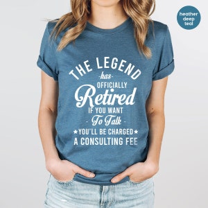 a woman wearing a t - shirt that says the legend has officially retired if you