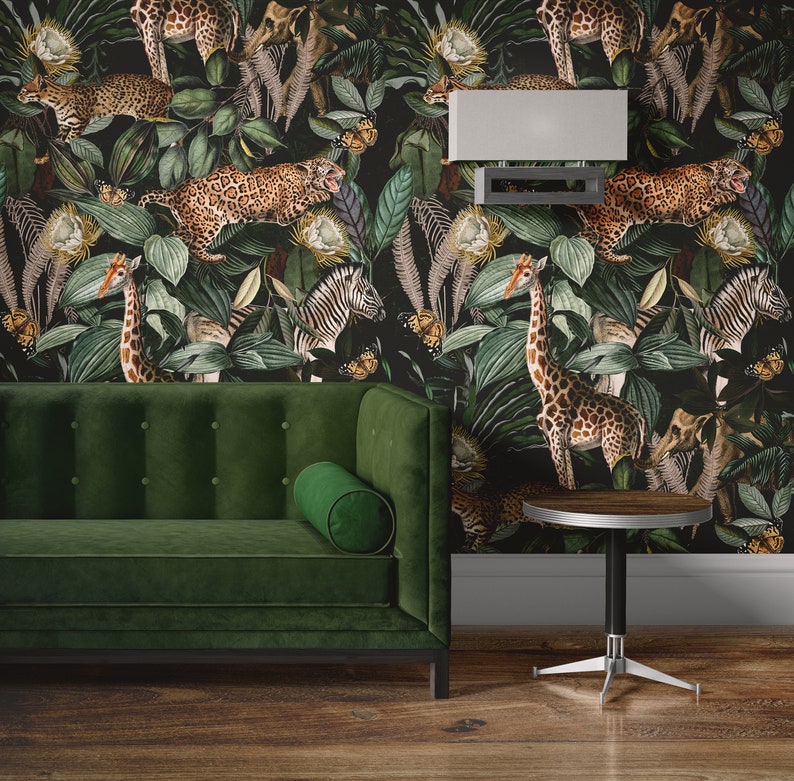 Cheetah jungle wallpaper in tropical dark style – cheetahs prowling with monkeys, giraffes and zebras in lush botanical leaves