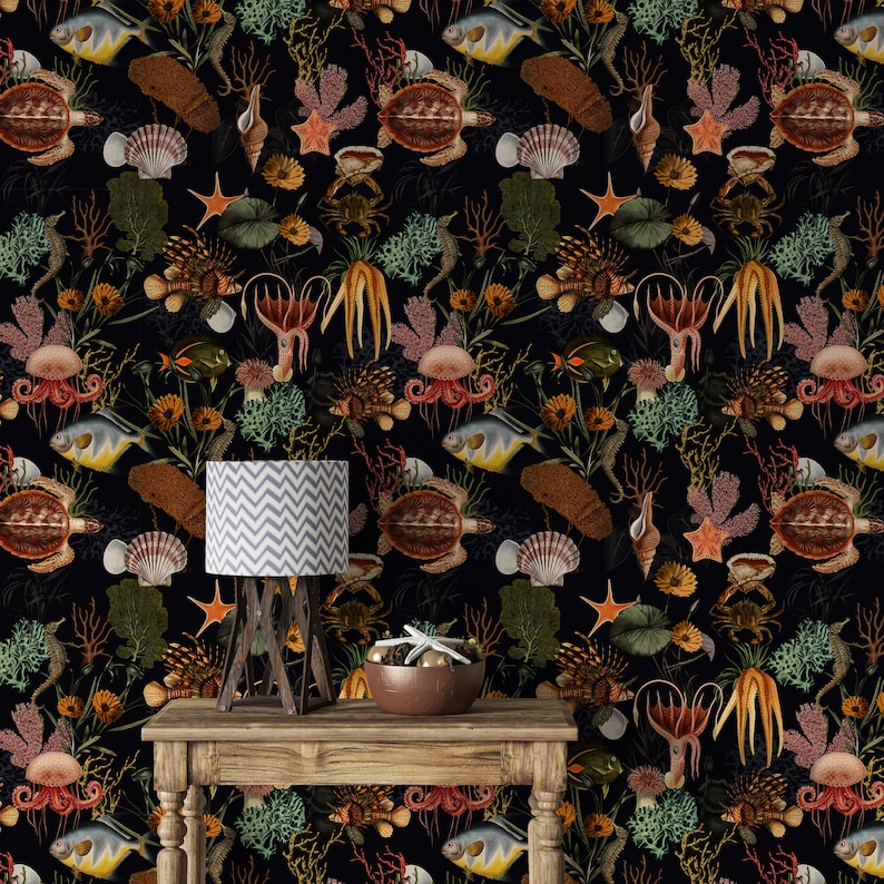 May include: A black and white wallpaper with a repeating pattern of sea creatures, shells, and coral. The wallpaper features a variety of sea life, including fish, seahorses, jellyfish, and starfish. The wallpaper is a great way to add a touch of the ocean to your home decor.