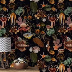 May include: A black and white wallpaper with a repeating pattern of sea creatures, including starfish, seahorses, jellyfish, and fish. The wallpaper has a vintage, botanical illustration style.