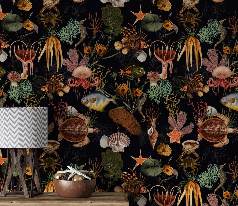 May include: A black and white wallpaper with a repeating pattern of sea creatures, including starfish, seahorses, jellyfish, and fish. The wallpaper has a vintage, botanical illustration style.