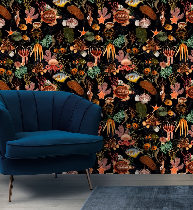 May include: A black background with a repeating pattern of sea life, including starfish, seashells, seahorses, and fish. The pattern is in shades of orange, red, yellow, blue, and green.
