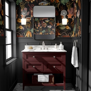 sea life wallpaper featuring colourful fish, coral, and seaweed. The wallpaper has a black background.