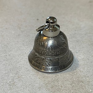 State and America the Beautiful (National parks and sites) quarter coin bell, copper clad