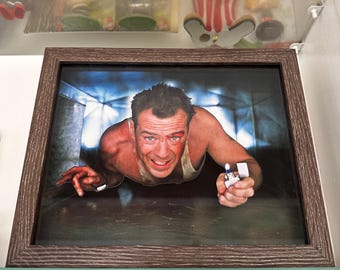 Arte mural de la película Duro de Matar. Arte 3D de la escena de ventilación de Bruce Willis, John McClane.