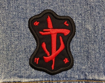 Parche bordado de Slayer Mark. Parches inspirados en videojuegos. Reverso termoadhesivo.