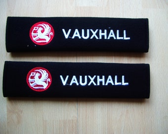 A pair of beautifully embroidered VAUXHALL soft seat belt covers free postage