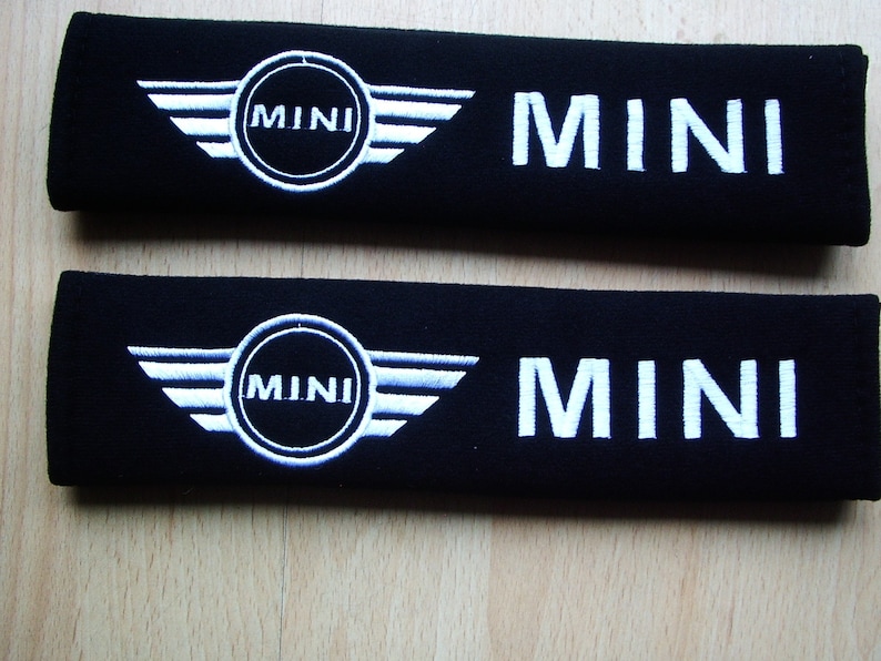 A pair of beautifully embroidered Mini seat belt covers image 1