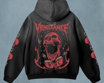 May include: A black hooded sweatshirt featuring a red graphic on the back. The design displays a screaming skull above an open book, surrounded by stars and coins, with the text "Taste VENGEANCE" above. Smaller skull graphics appear on both sleeves.