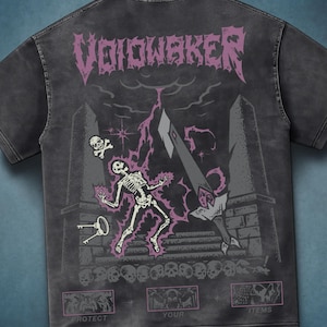 May include: Dark gray t-shirt with a graphic design featuring a skeleton, keys, and the text "VOIDWAKER" in purple. The design includes a skull and crossbones, lightning, and the words "PROTECT YOUR ITEMS".
