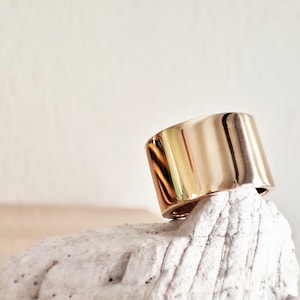 Minimalistic wide tube band ring by Glafx Jewelry.