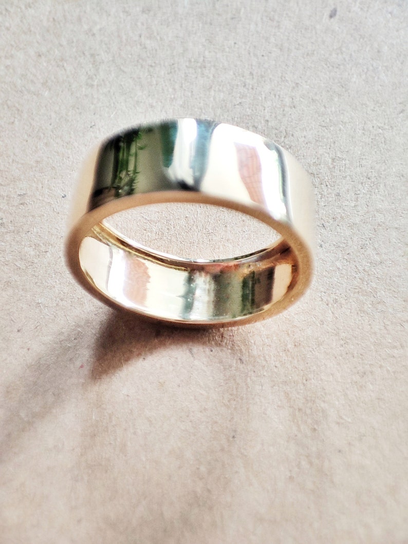 Minimal large wide tube band ring by Glafx Jewelry.