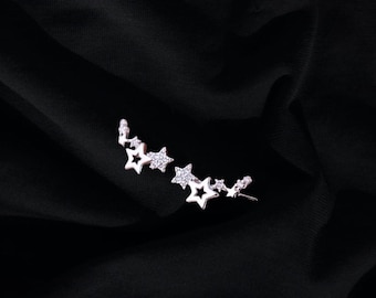 Pendientes de plata con diamantes y estrellas