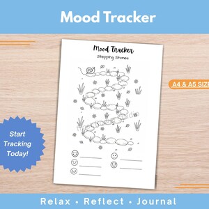 Puede incluir: Un diario blanco de seguimiento del estado de ánimo con el texto "Mood Tracker" y "Stepping Stones". El diario presenta un camino de piedras con ilustraciones de caracoles, flores y hierba. El texto "Start Tracking Today!" está en una estrella azul.