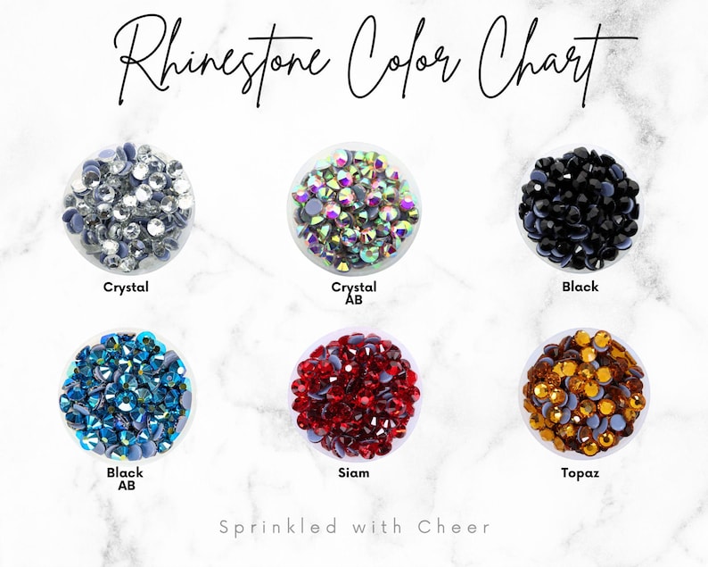 May include: A rhinestone color chart with six color variations: Crystal, Crystal AB, Black, Black AB, Siam, and Topaz. The text "Rhinestone Color Chart" is at the top, and "Sprinkled with Cheer" is at the bottom.