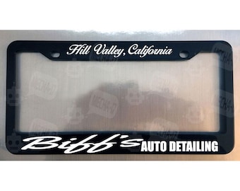 Back To The Future Style License Plate Frame – 'Roads? Where We're Going We Don't Need Roads' – Black Plastic