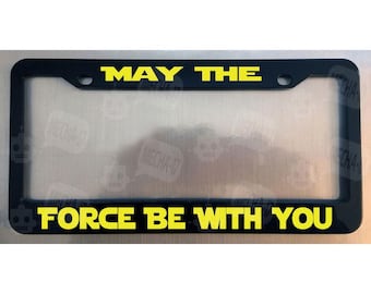 Marco para matrícula negro brillante "Que la fuerza te acompañe"