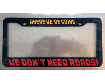Where We're Going We Don't Need Roads Glossy Black License Plate Frame