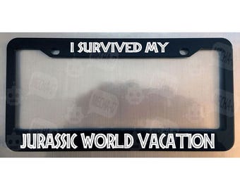 I Survived My Jurassic World Vacation Glossy Black License Plate Frame
