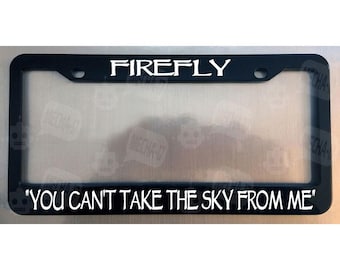 Marco para matrícula en negro brillante con la frase "No puedes quitarme el cielo"