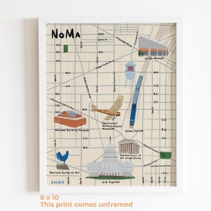 May include: A framed 8 x 10 inch print of a map of the NoMa neighborhood, featuring illustrations of landmarks like the U.S. Capitol and Union Station. The print includes street names and the text "NoMa" at the top.