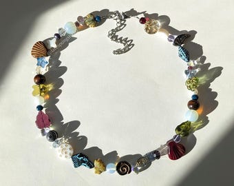 DEC handmade beaded necklace / whimsical glass stainless steel cottagecore fairy spiral swirl whimsigoth forest nature seashell fall leaves