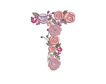 Peut inclure: Une lettre T florale avec des fleurs roses et violettes et des feuilles vertes.