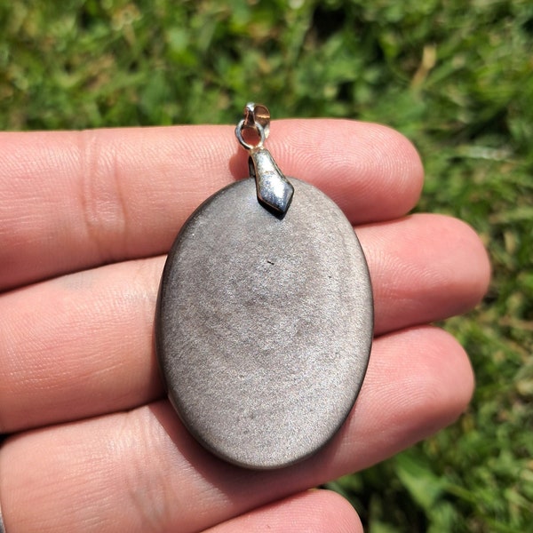 Natural stone pendant of silver obsidian on nickel-free ram