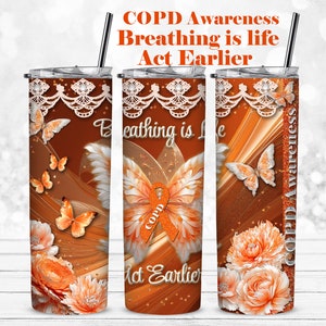 May include: A stainless steel tumbler with a brown and orange design featuring butterflies, flowers, and the text "COPD Awareness Breathing is life Act Earlier".