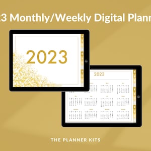 May include: Two digital planners for 2023 on tablet screens. The first planner has a gold glitter design with the year 2023 in large gold text. The second planner shows a full year calendar with each month displayed in a separate box.