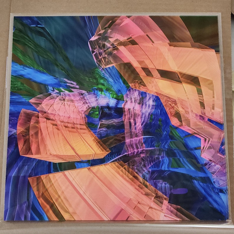 May include: Abstract art print featuring layered geometric shapes in shades of orange, pink, and blue. The artwork has a digital, crystalline appearance with a sense of depth and movement. The background has a flowing, watercolor-like effect.