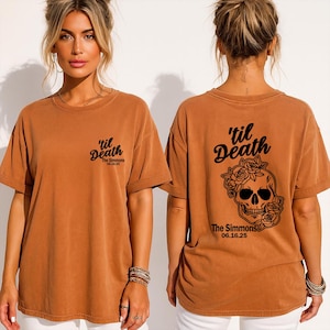 May include: A rust-colored t-shirt with the phrase "'til Death" printed in black on the front and back. The back features a skull design with roses and the text "The Simmons 06.16.25".