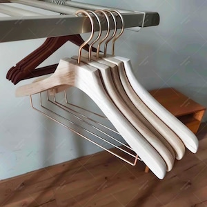 Wooden coat hangers spotlight hotsell