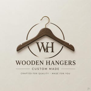 May include: A dark brown wooden clothes hanger with a gold metal hook, positioned above the letters WH inside a circular frame. The text reads WOODEN HANGERS, CUSTOM MADE, CRAFTED FOR QUALITY, MADE FOR YOU in a dark brown serif font on a light background.