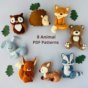 Puede incluir: Se muestran ocho patrones de animales de fieltro, incluyendo un búho, un erizo, un zorro, un oso, un conejo, una ardilla, un ciervo y un mapache. El texto "8 Animal PDF Patterns" se muestra en el centro.