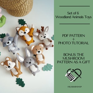 May include: Set of six felt woodland animal toys, including a fox, deer, raccoon, bear, bunny, and squirrel. The toys are arranged on a white background with green felt leaves. The image includes the text "Set of 6 Woodland Animals Toys", "PDF PATTERN + PHOTO TUTORIAL", "BONUS: THE MUSHROOM PATTERN AS A GIFT", and "HELISBABYSHOP".