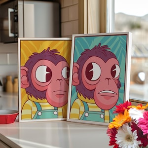May include: Two framed illustrations of a cartoon monkey with large eyes wearing a striped shirt and blue overalls. The monkey on the left has a yellow background and the monkey on the right has a blue and green background.