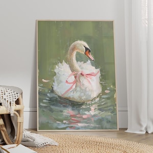 May include: A white swan with a pink ribbon around its neck floats on a green pond. The swan's head is turned to the side, and its feathers are ruffled. The water is calm and reflects the sky.