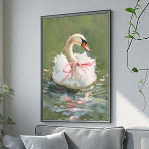 May include: A white swan with a pink ribbon around its neck floats on a green pond. The swan's head is turned to the side, and its feathers are ruffled. The water is calm and reflects the sky.