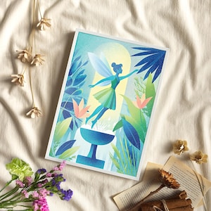 May include: A framed art print featuring a fairy in a green and blue dress with translucent wings, surrounded by lush foliage in shades of green and blue. The fairy is reaching towards a blue fountain. The background has a soft yellow glow.